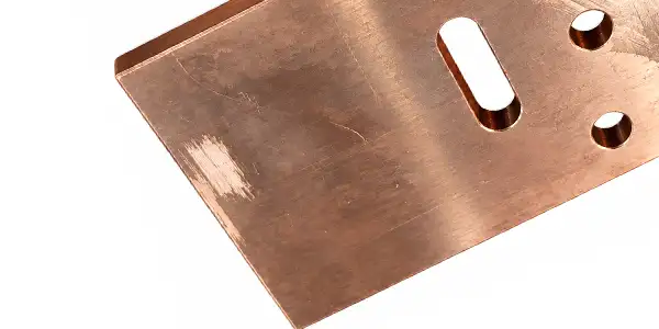 CNC busbar cutting machine station cutting a bar to length